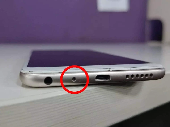 tiny phone hole