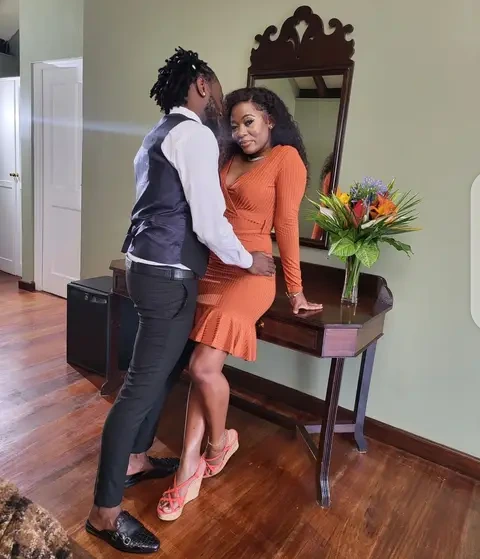 bahati and a woman